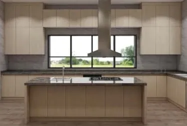 Front view of an island with a cooktop and sink, a stainless hood above and a long window behind
