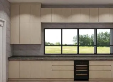 Long counter of light oak cabinets under a wide window with an undercounter wine fridge