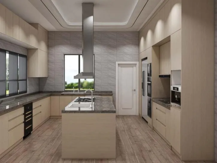 Galley view of a light oak kitchen with gray stone-look wall tile, an island hood and tall cabinets with built-in ovens