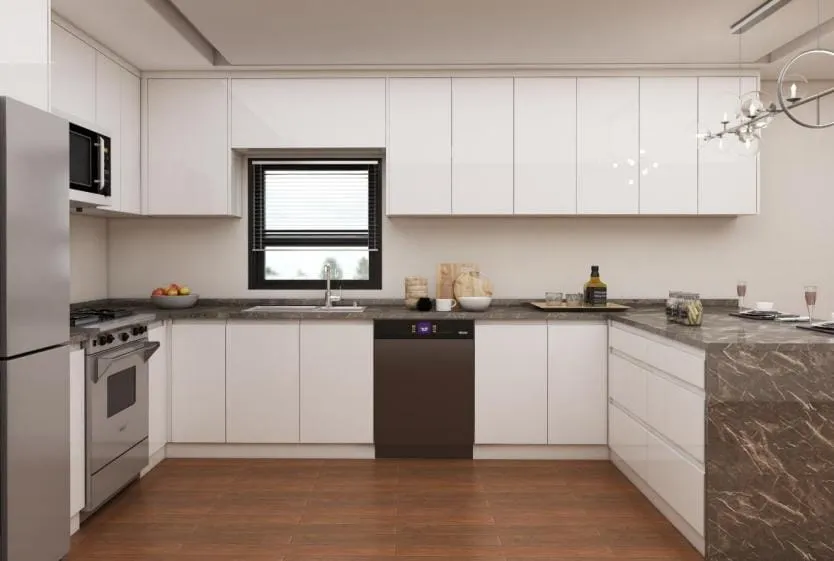 U-shaped kitchen with white slab uppers, brown veined counters and a dark dishwasher under the window