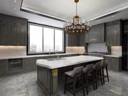 Dark gray traditional kitchen with a white marble island seating four under a bronze chandelier