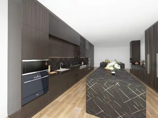 Long galley with walnut tall cabinets, a built-in black oven and a black veined waterfall island