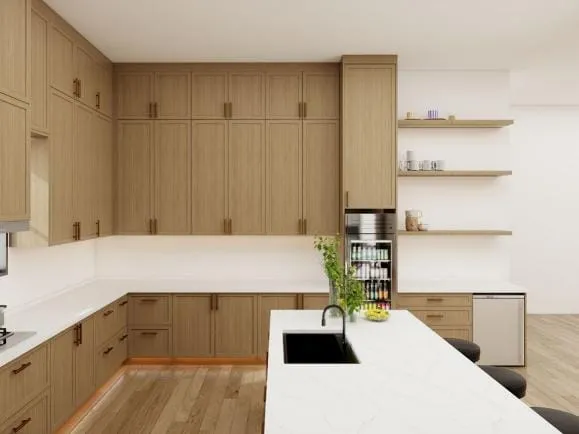 White oak Shaker kitchen with a white quartz island, black sink and floating shelves