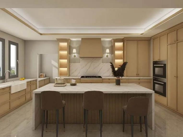 Oak kitchen with a wood-clad range hood, lit glass display cabinets, sconces and an island with fluted base