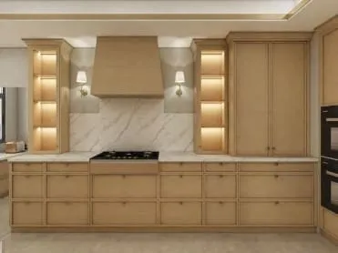 Cooktop wall with a wood-clad hood, marble-look backsplash, brass sconces and lit open shelves on both sides