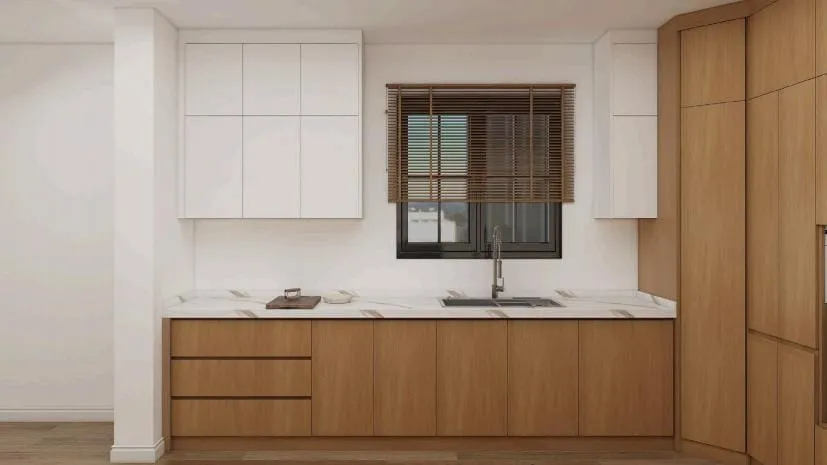 Sink wall with white slab uppers, oak base cabinets and a window with wood blinds