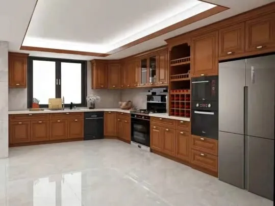 L-shaped cherry kitchen with a stainless refrigerator, black ovens and a glossy light floor