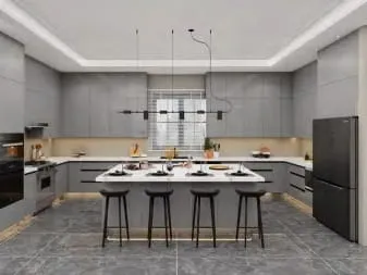 Front view of a gray kitchen with an island seating four under a linear pendant