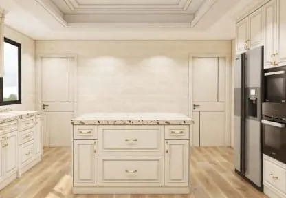 Cream island with drawers and a speckled counter between two paneled doors