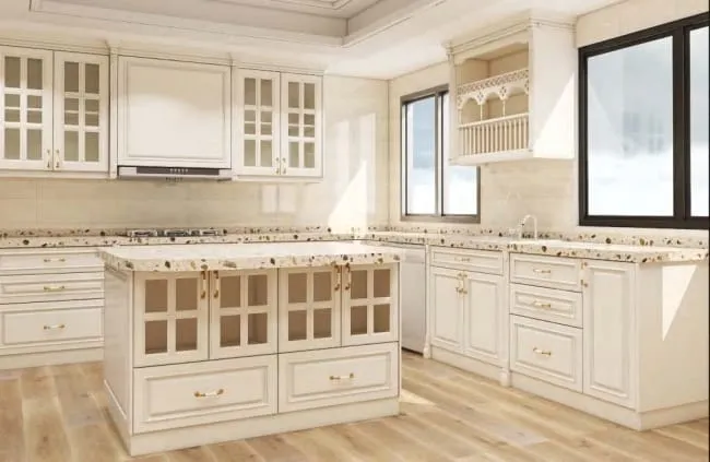 Cream kitchen with a glass-front island, terrazzo-style counters and light oak floor