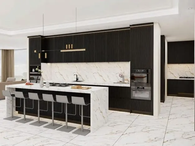 Black fluted cabinets with a gold-veined white marble backsplash and waterfall island with six stools