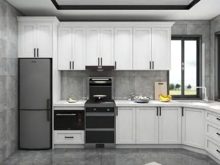 White Shaker kitchen with a stainless refrigerator, black range and built-in oven against gray tile