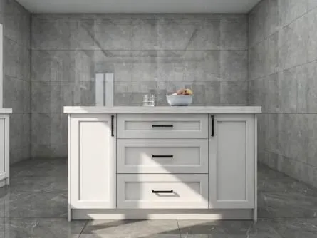 White Shaker island with three deep drawers in front of gray stone-look walls
