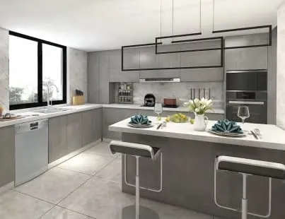Dining counter set for two in front of gray cabinets and a window over the sink