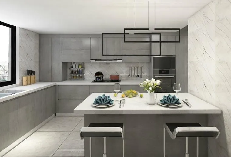 Front view of a gray kitchen with a white counter, frame pendants and two stools