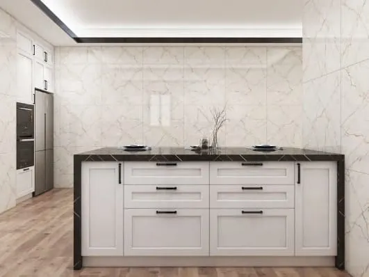 White Shaker island with drawers and a black stone waterfall top