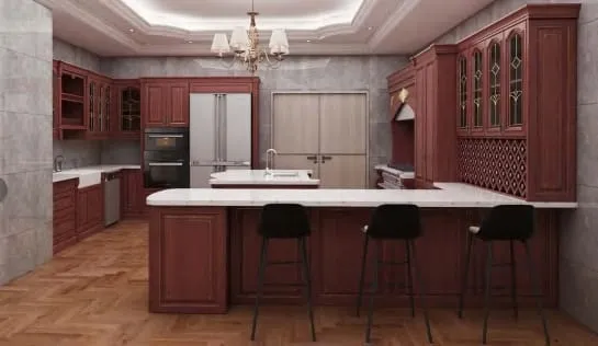 Cherry peninsula with three black stools under a chandelier in a recessed ceiling