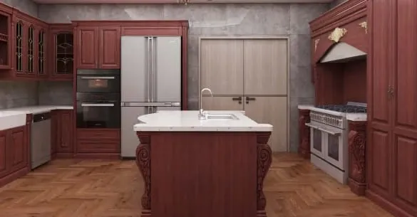 Island with carved legs facing wall ovens, a stainless refrigerator and paneled pantry doors