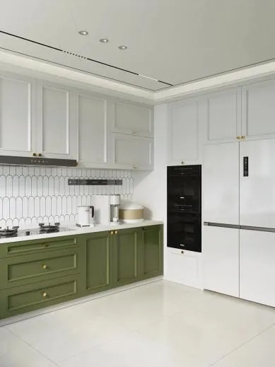 Olive green Shaker base cabinets with white uppers, white picket tile backsplash and black built-in ovens