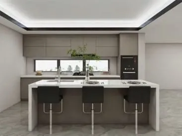 Front view of a white island with black stools in front of taupe cabinets and a built-in oven