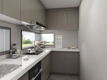Corner of a taupe kitchen with a cooktop below a ribbon window