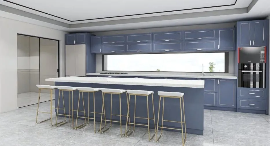 Long white island with six brass-frame stools in front of slate blue cabinets