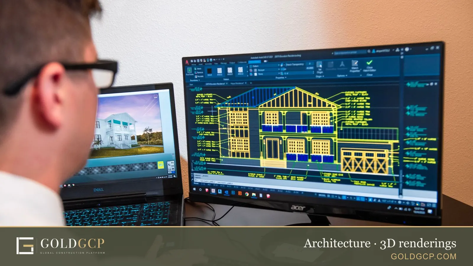 An architect reviewing house designs on two computer monitors