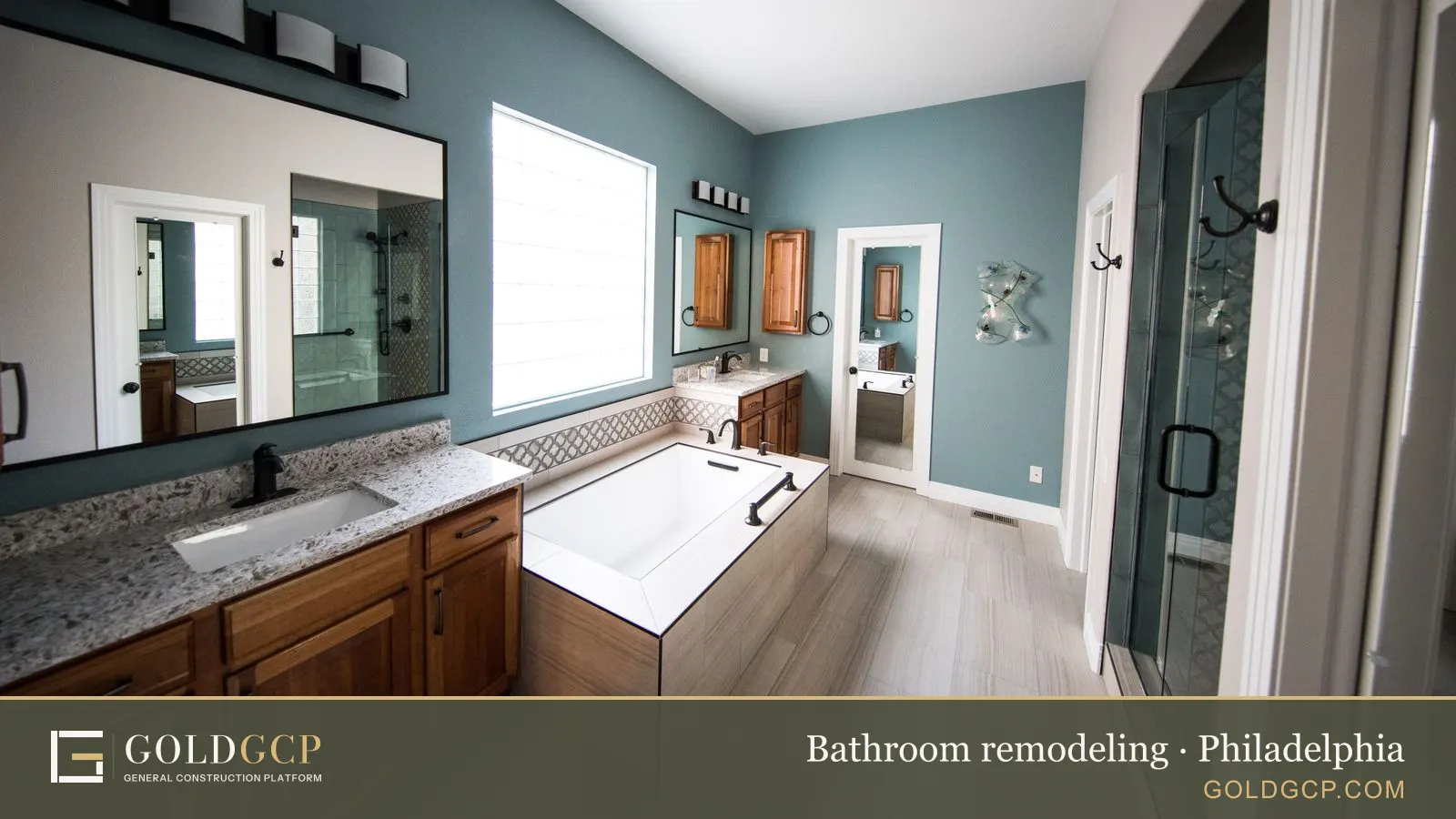 Spacious modern bathroom with a freestanding bathtub, wooden cabinets, and granite countertops.