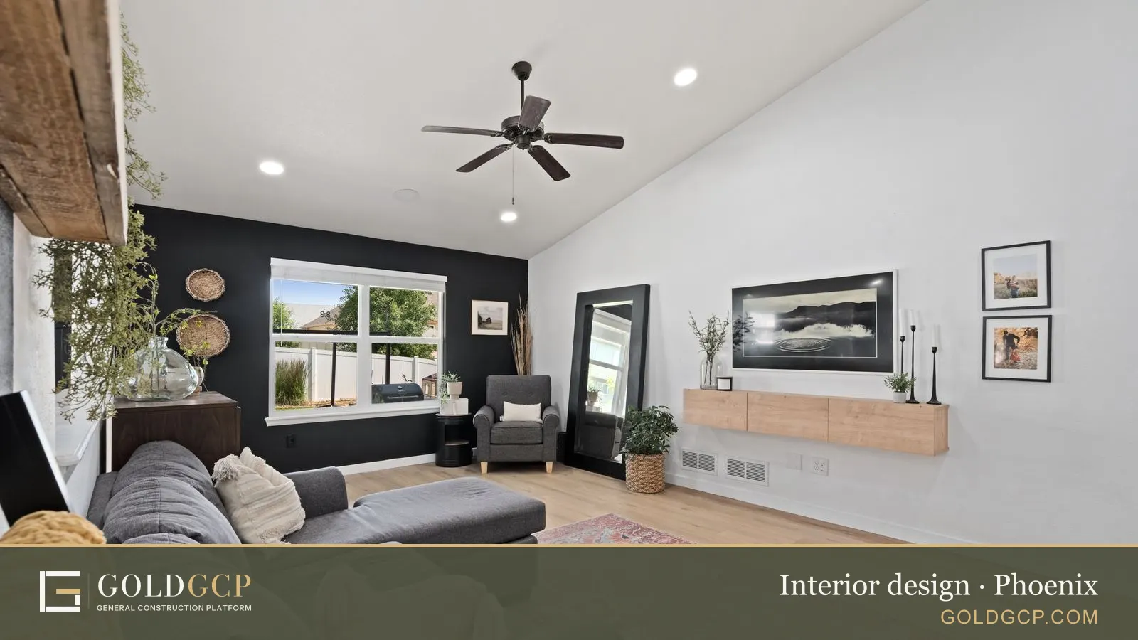 Stylish cozy modern living room with a sectional couch, decorative elements, and natural light through large windows.