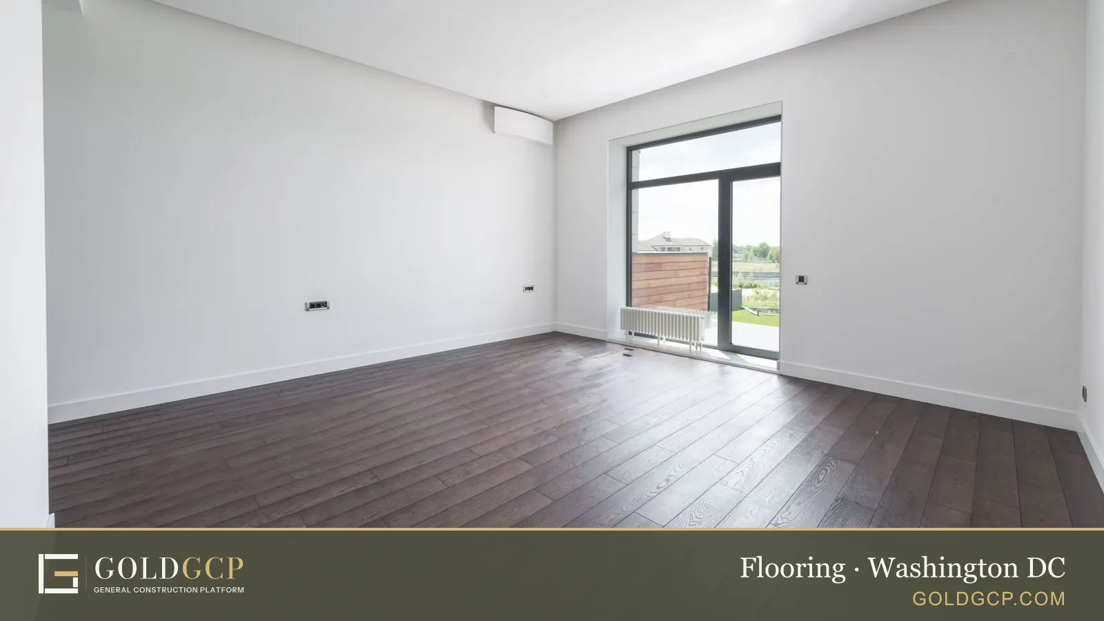 Spacious empty room in a new apartment with wooden parquet floor and white wall on a sunny day