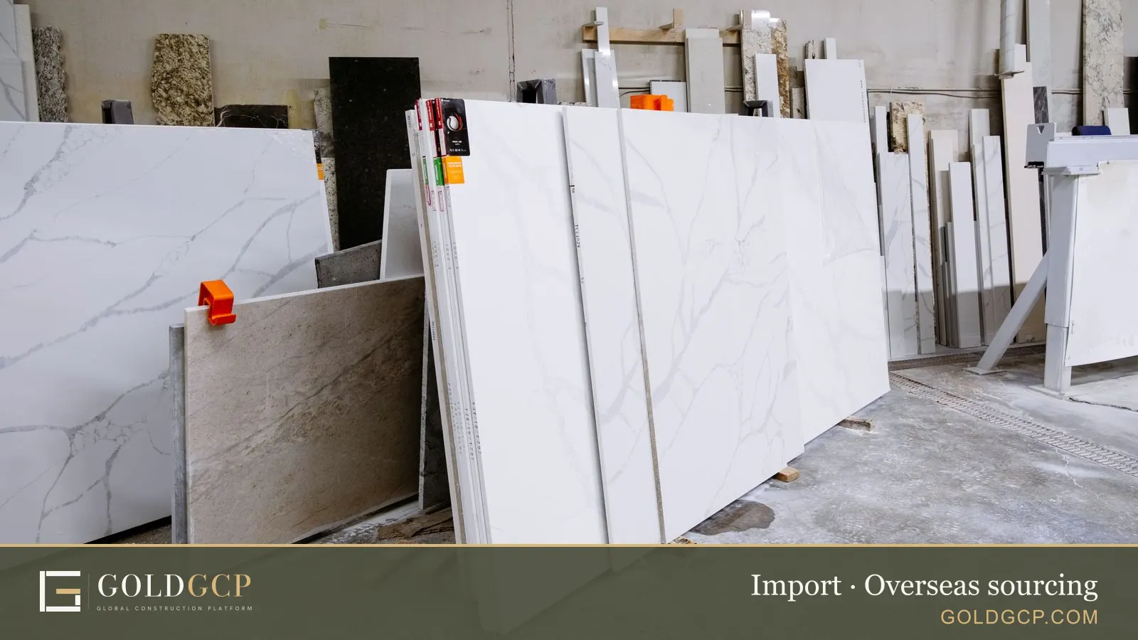 Granite and marble slabs lined up in a stone factory