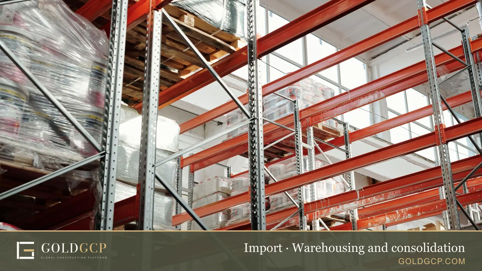 Pallets and storage racks inside a bright warehouse