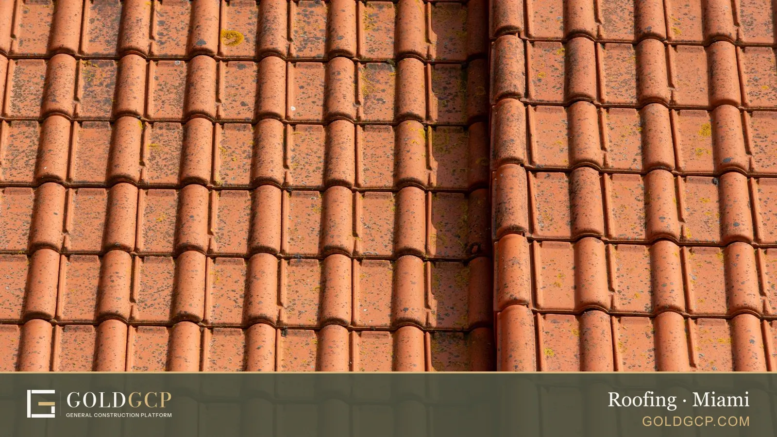 Close-up of terracotta clay roof tiles laid in neat rows