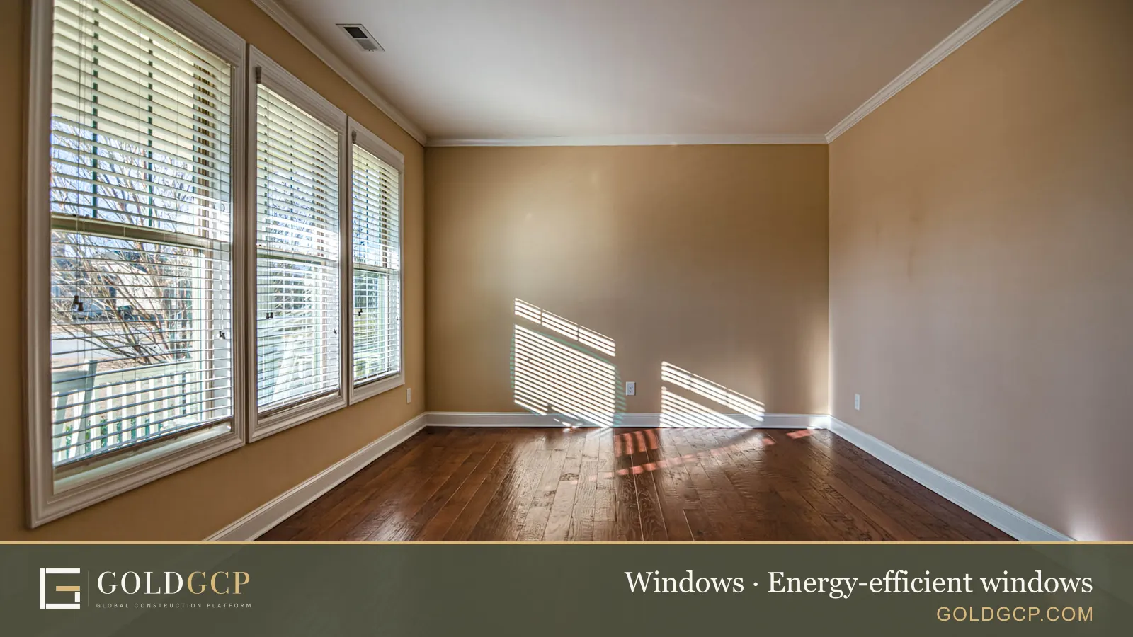 Sunlight coming through large windows into an empty room