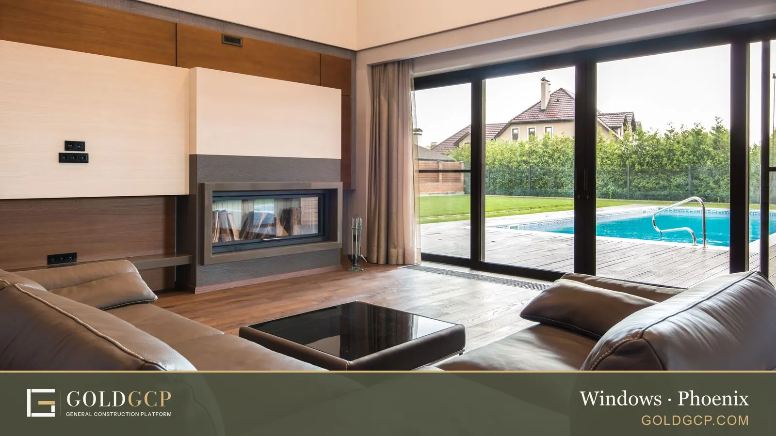 A modern living room with large glass doors opening to a poolside patio