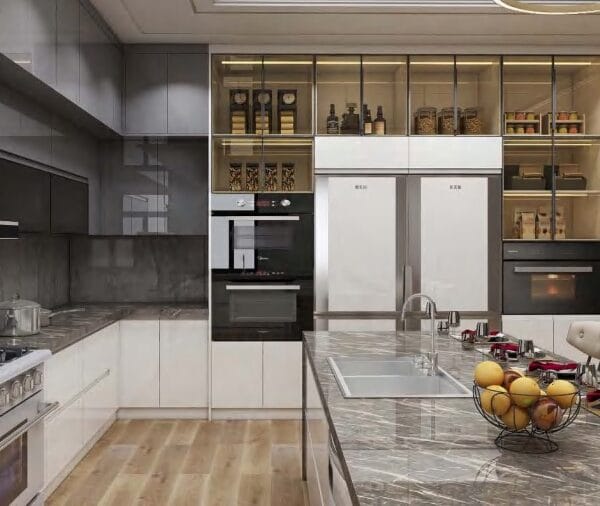 High-end Beverly Hills kitchen with marble island and gold accents.