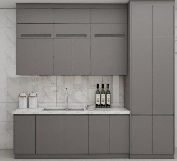 Boston kitchen renovation with shaker cabinets and marble counters.